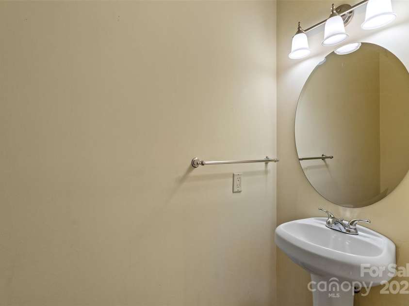 80 Ivy Cove Road, Fairview, NC 28730.  MLS# CAR4249223, YatesRealty ID 11363. Half bath in foyer