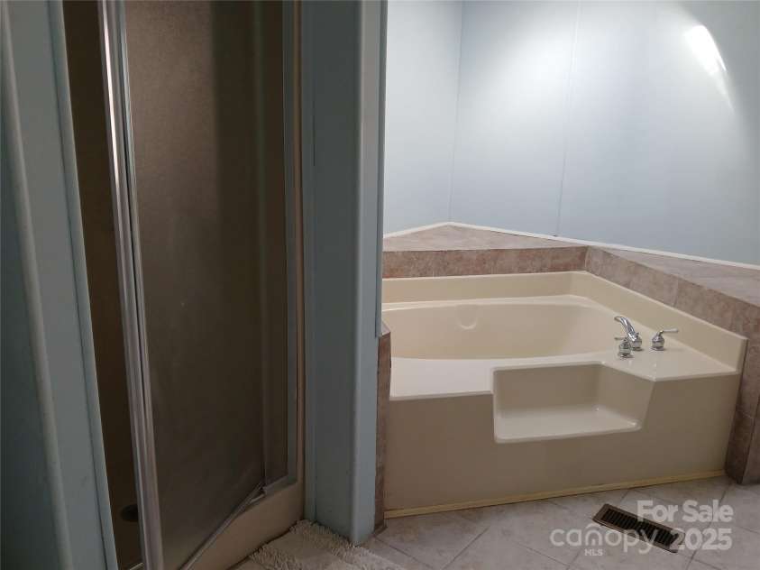 311 Coopers Gap Road, Rutherfordton, NC 28139.  MLS# CAR4213736, YatesRealty ID 11367. Master Separate shower