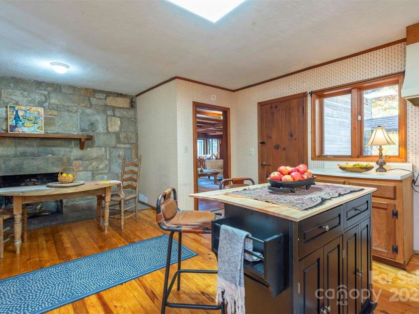 102 Weaver Mill Road, Columbus, NC 28722.  MLS# CAR4211548, YatesRealty ID 1137. A door leads out to the patio for outdoor dining