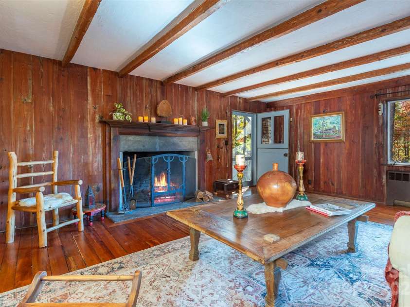 102 Weaver Mill Road, Columbus, NC 28722.  MLS# CAR4211548, YatesRealty ID 1137. One of 5 fireplaces add to that cozy feeling.