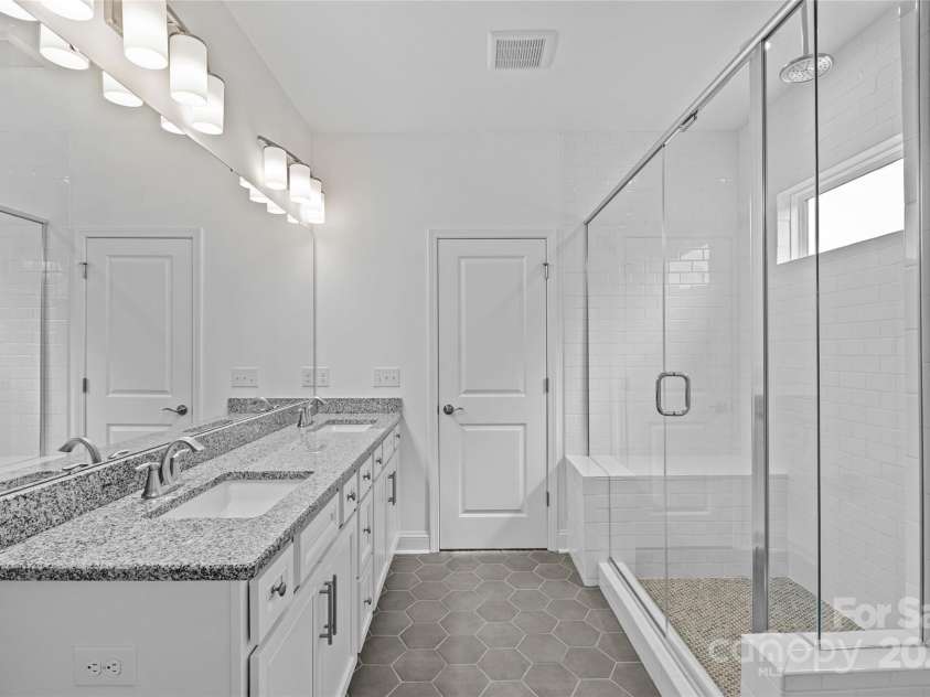 13939 Penbury Lane, Charlotte, NC 28278.  MLS# CAR4251944, YatesRealty ID 11372. Owner's bathroom