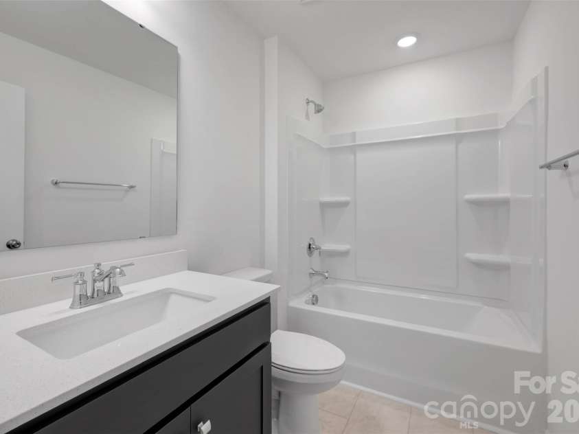 408 Willoughby Park Drive, Monroe, NC 28112.  MLS# CAR4337621, YatesRealty ID 11373. Second floor secondary bathroom