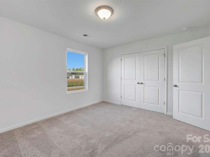 408 Willoughby Park Drive, Monroe, NC 28112.  MLS# CAR4337621, YatesRealty ID 11373. Second floor secondary bedroom