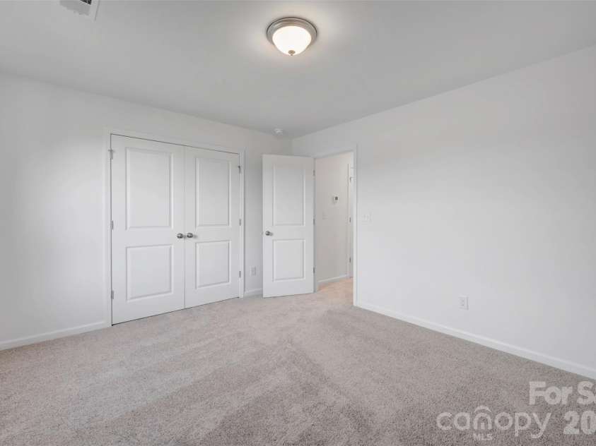 408 Willoughby Park Drive, Monroe, NC 28112.  MLS# CAR4337621, YatesRealty ID 11373. Second floor secondary bedroom