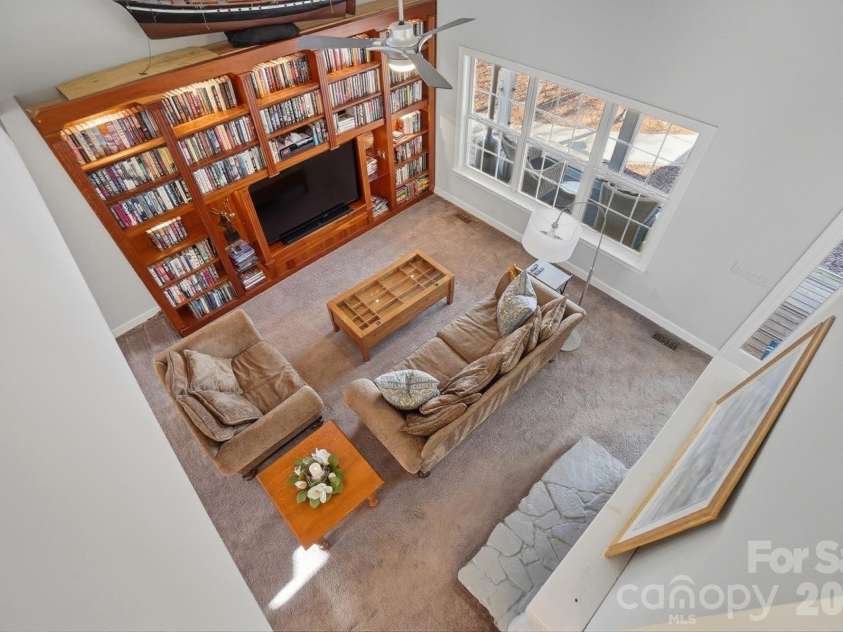 4737 Betty Davis Drive, York, SC 29745.  MLS# CAR4342456, YatesRealty ID 11374. At the heart of the home is a stunning two-storey great room, anchored by a wood-burning fireplace and soaring ceilings that draw your eye upward.