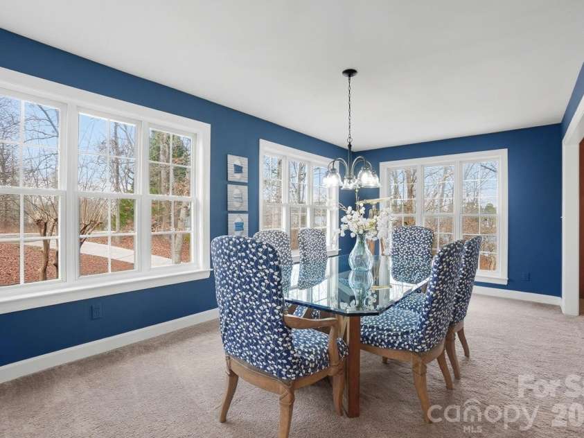 4737 Betty Davis Drive, York, SC 29745.  MLS# CAR4342456, YatesRealty ID 11374. Love to host? This one’s for you. A generous dining room surrounded by windows creates a stunning backdrop for entertaining — offering panoramic views and an airy atmosphere your guests won’t forget.