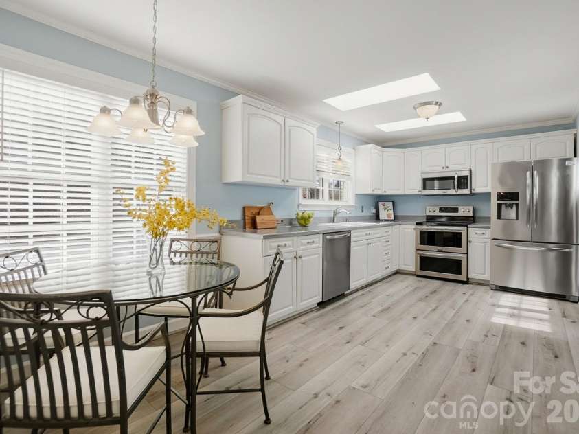 4737 Betty Davis Drive, York, SC 29745.  MLS# CAR4342456, YatesRealty ID 11374. The beautifully finished LVP flooring adds warmth and durability — stylish, easy to care for, and ideal for busy households.