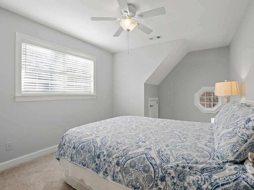 4737 Betty Davis Drive, York, SC 29745.  MLS# CAR4342456, YatesRealty ID 11374. The upper level offers two comfortable secondary bedrooms with access to a full bathroom, providing privacy and convenience for overnight guests or extended visits.