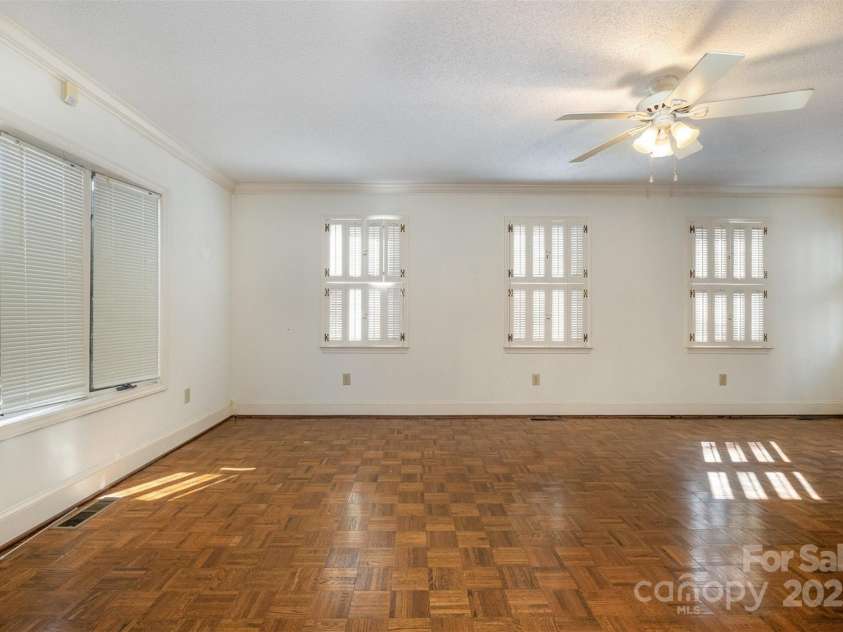 457 Birchwood Trail, Concord, NC 28025.  MLS# CAR4223374, YatesRealty ID 11376. Inviting Sunroom/2nd living area.  Lot's of windows let in the natural light