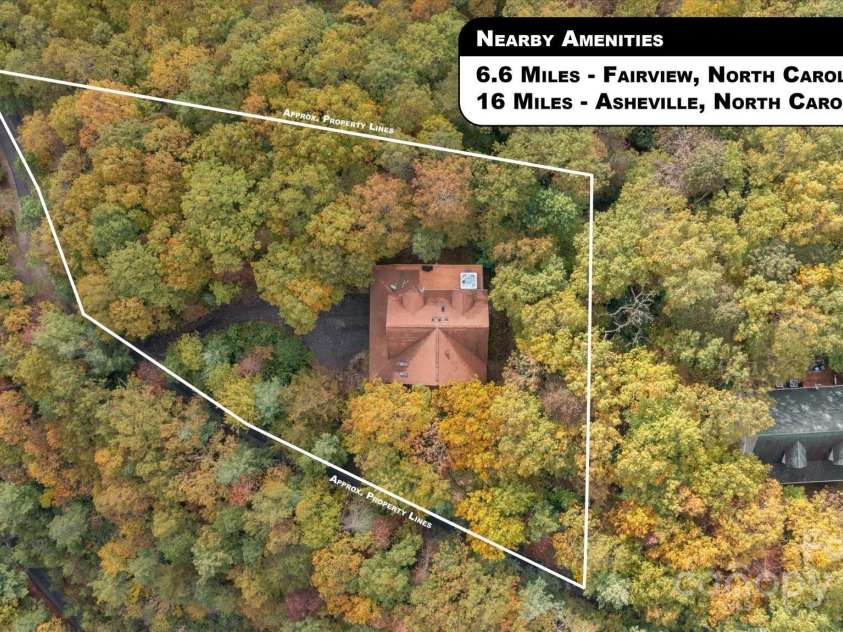 94 Davey Crockett Road, Fairview, NC 28730.  MLS# CAR4310188, YatesRealty ID 11377. Aerial Image with Approximate Property Lines