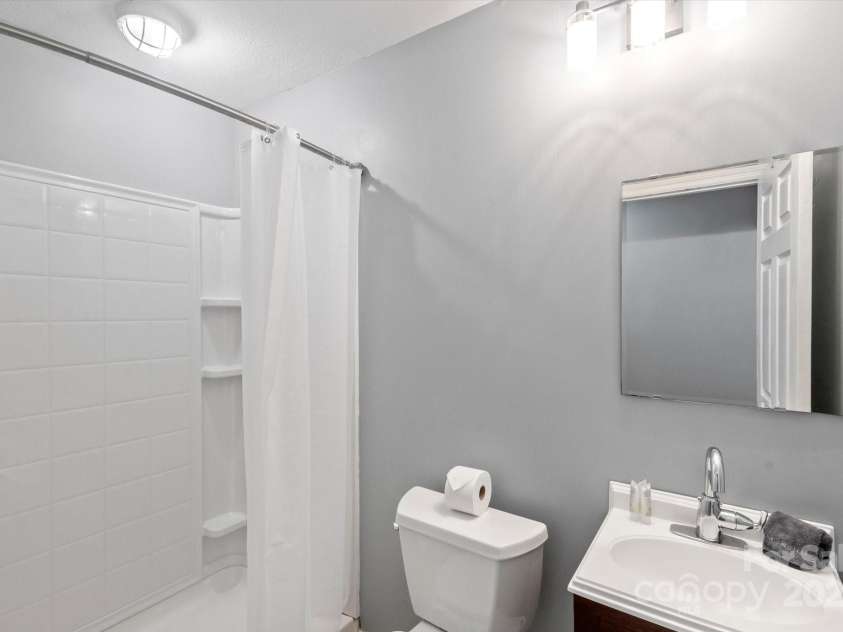 94 Davey Crockett Road, Fairview, NC 28730.  MLS# CAR4310188, YatesRealty ID 11377. Basement Full Bathroom