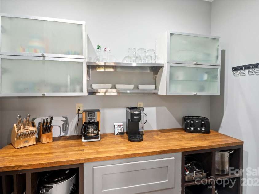 94 Davey Crockett Road, Fairview, NC 28730.  MLS# CAR4310188, YatesRealty ID 11377. Butler's Pantry