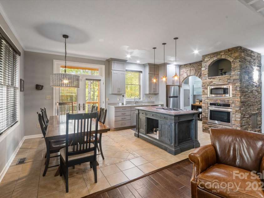 94 Davey Crockett Road, Fairview, NC 28730.  MLS# CAR4310188, YatesRealty ID 11377. Dining Room/Kitchen