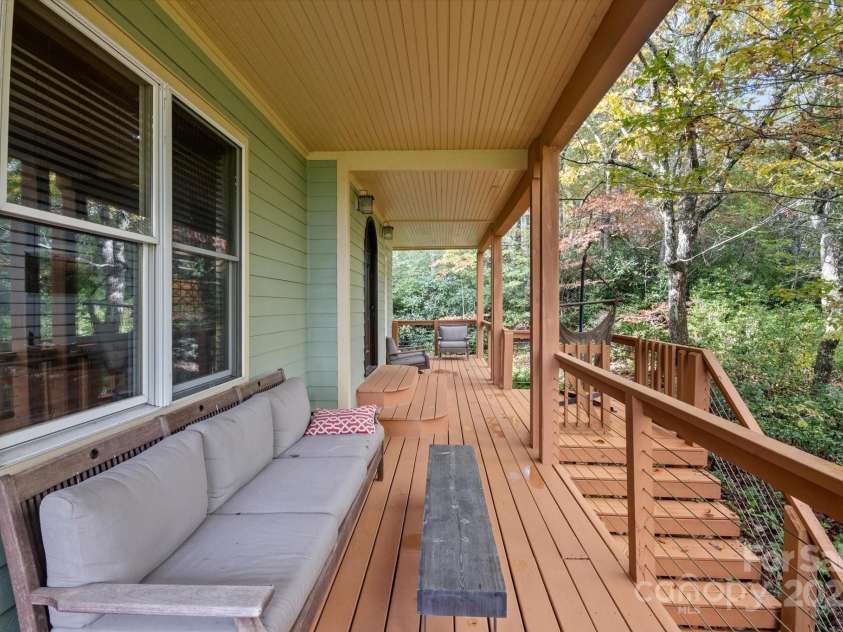 94 Davey Crockett Road, Fairview, NC 28730.  MLS# CAR4310188, YatesRealty ID 11377. Huge Porch Perfect for Relaxing