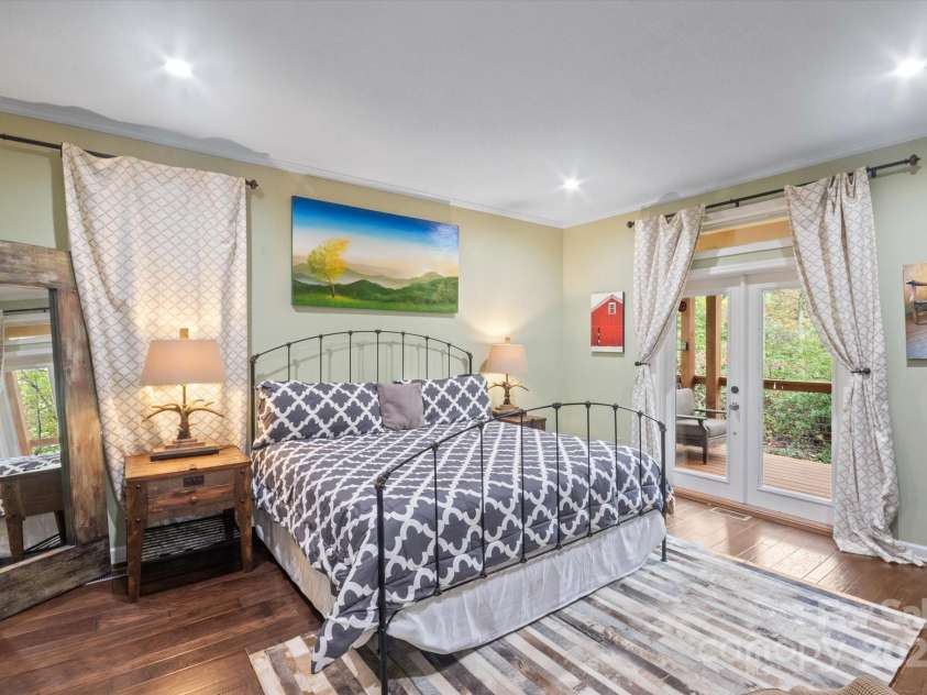 94 Davey Crockett Road, Fairview, NC 28730.  MLS# CAR4310188, YatesRealty ID 11377. Primary Bedroom