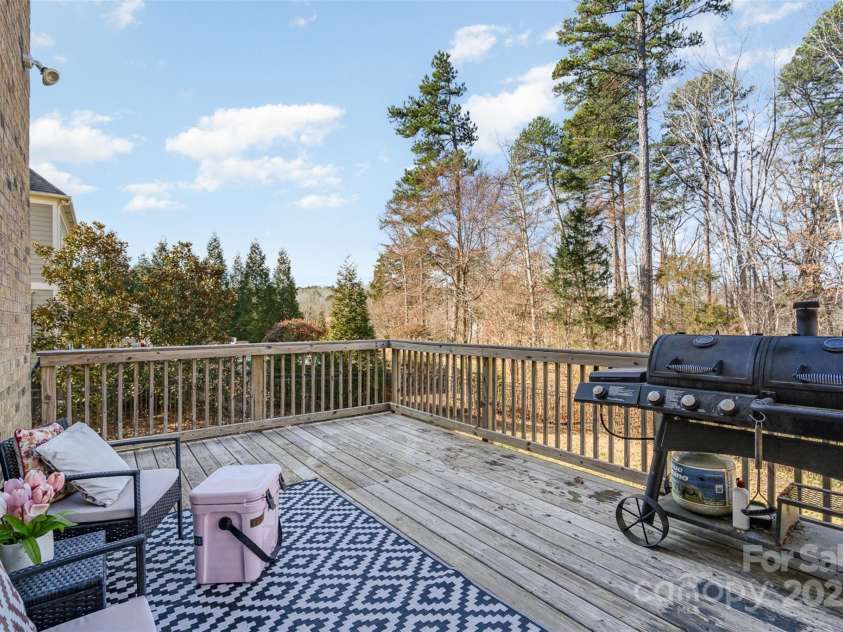 14018 Promenade Drive, Huntersville, NC 28078.  MLS# CAR4216690, YatesRealty ID 11390. Deck overlooking natural area