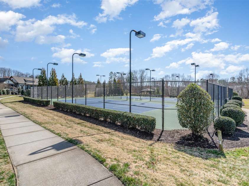 14018 Promenade Drive, Huntersville, NC 28078.  MLS# CAR4216690, YatesRealty ID 11390. Lighted tennis courts