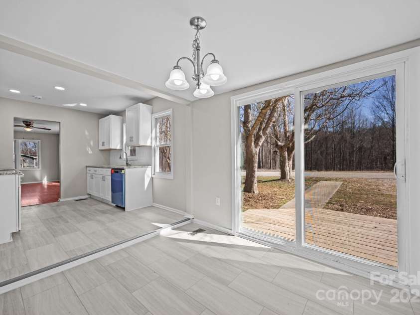 175 Kathy Street, Marion, NC 28752.  MLS# CAR4230651, YatesRealty ID 11391. Access to deck from dining area