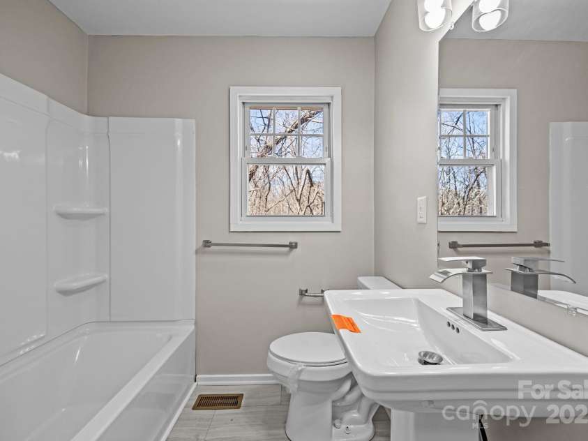 175 Kathy Street, Marion, NC 28752.  MLS# CAR4230651, YatesRealty ID 11391. Hall bathroom