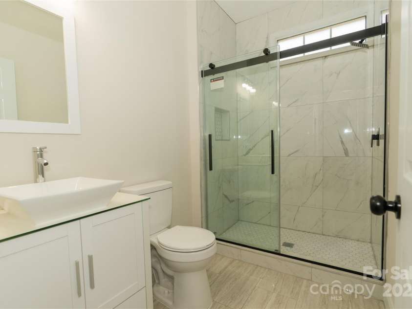 4410 Laurel Twig Court, Charlotte, NC 28215.  MLS# CAR4251605, YatesRealty ID 11395. Full bathroom on main level