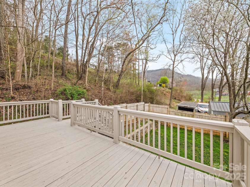 144 Pinehaven Drive, Clyde, NC 28721.  MLS# CAR4242405, YatesRealty ID 11396. Decking w/view      