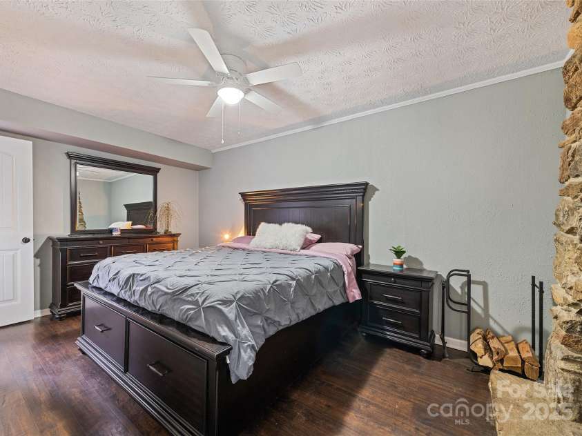 144 Pinehaven Drive, Clyde, NC 28721.  MLS# CAR4242405, YatesRealty ID 11396. Large, primary, ground floor bd. rm.suite