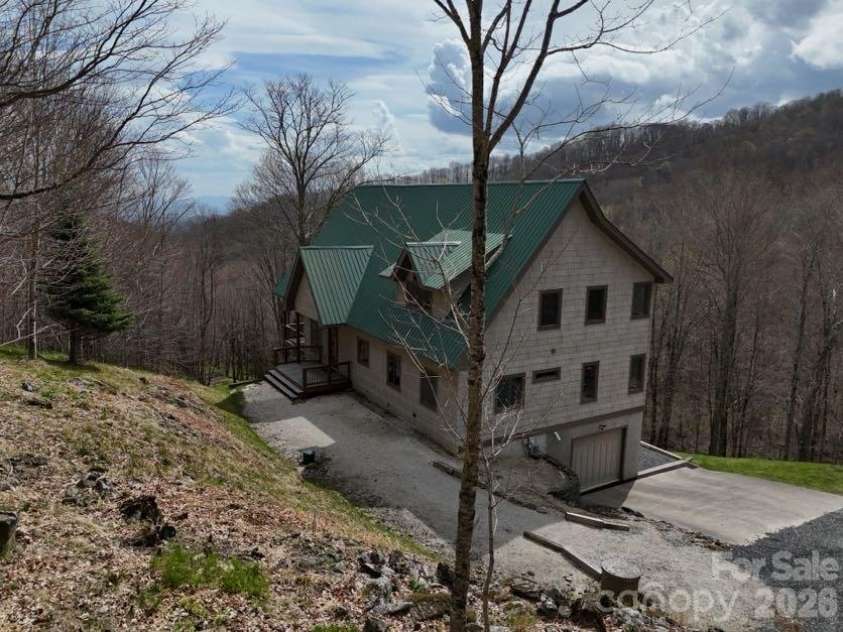 155 Mule Trail Drive, Bakersville, NC 28705.  MLS# CAR4354297, YatesRealty ID 11397. Spring view