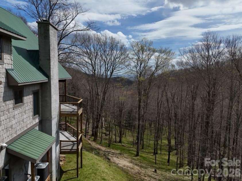 155 Mule Trail Drive, Bakersville, NC 28705.  MLS# CAR4354297, YatesRealty ID 11397. Spring view