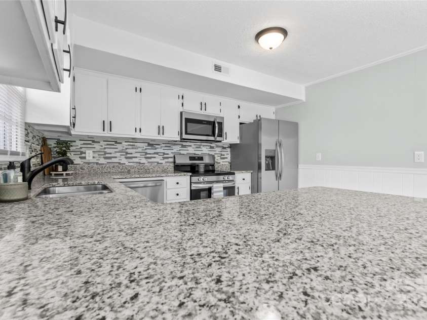 305 Mountain View Drive, Morganton, NC 28655.  MLS# CAR4230728, YatesRealty ID 11399. 