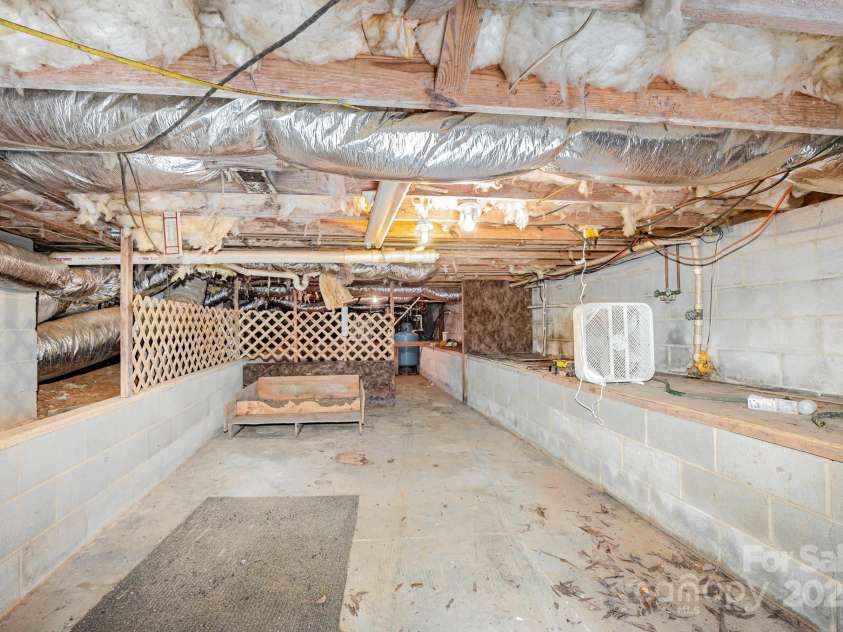 240 Partridge Run, Salisbury, NC 28147.  MLS# CAR4305095, YatesRealty ID 11401. An exceptional crawlspace.....a sizeable part has a cement floor and a good-sized area for extra storage.
