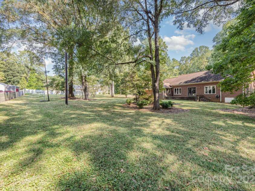 240 Partridge Run, Salisbury, NC 28147.  MLS# CAR4305095, YatesRealty ID 11401. Summerfield is known for its park-like setting. This backyard is a lovely example.