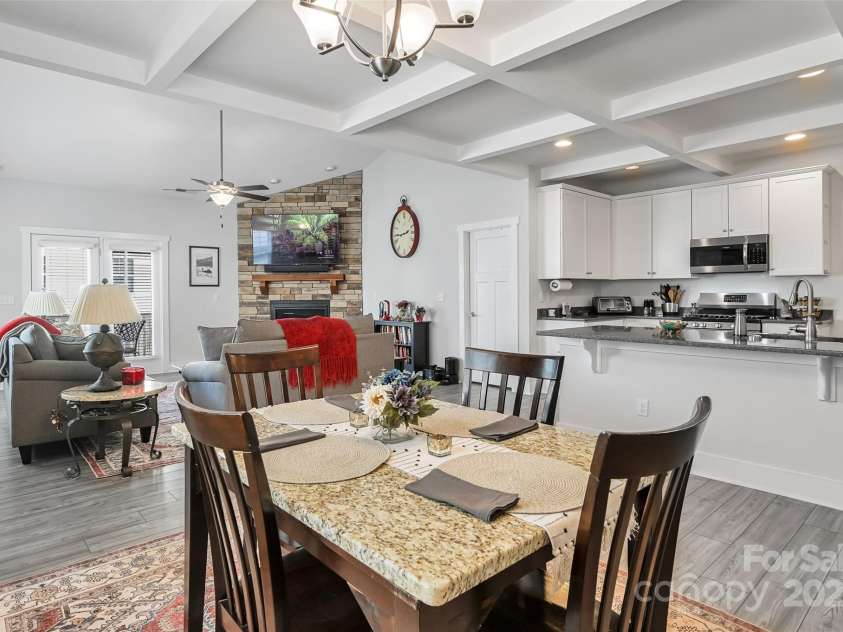 22 Hyde Park Place, Arden, NC 28704.  MLS# CAR4239022, YatesRealty ID 11411. Coffered Ceiling in Dining Room & Kitchen