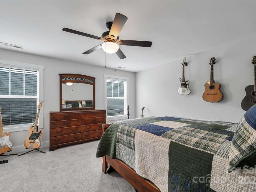 22 Hyde Park Place, Arden, NC 28704.  MLS# CAR4239022, YatesRealty ID 11411. Huge Guest Bedroom with Storage