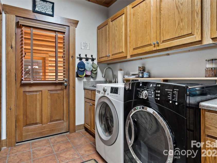 163 Gypsy Mountain Road, Marion, NC 28752.  MLS# CAR4287037, YatesRealty ID 11413. Laundry