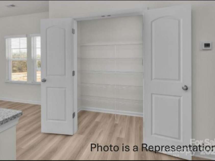 487 Shasta Street, Gastonia, NC 28052.  MLS# CAR4256622, YatesRealty ID 11415. Sierra Ridge Townhomes Gourmet Kitchen-Walk in Pantry