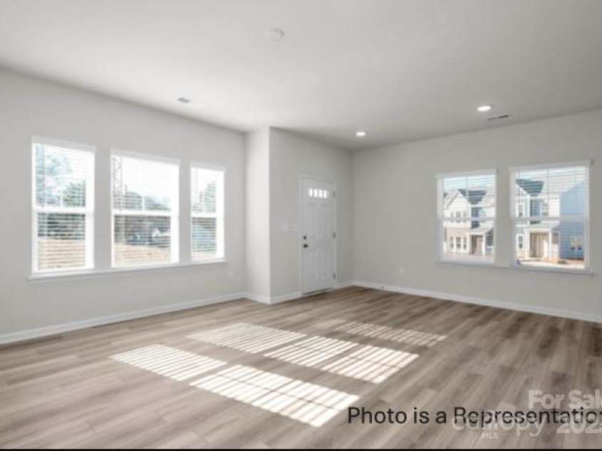 487 Shasta Street, Gastonia, NC 28052.  MLS# CAR4256622, YatesRealty ID 11415. Sierra Ridge Townhomes  Living/Dining Areas