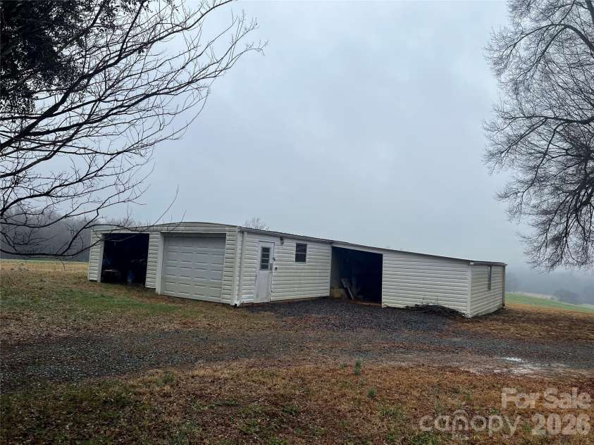 32646 Bridge Road, Mount Pleasant, NC 28124.  MLS# CAR4366203, YatesRealty ID 11419. Single car detached garage with workshop
