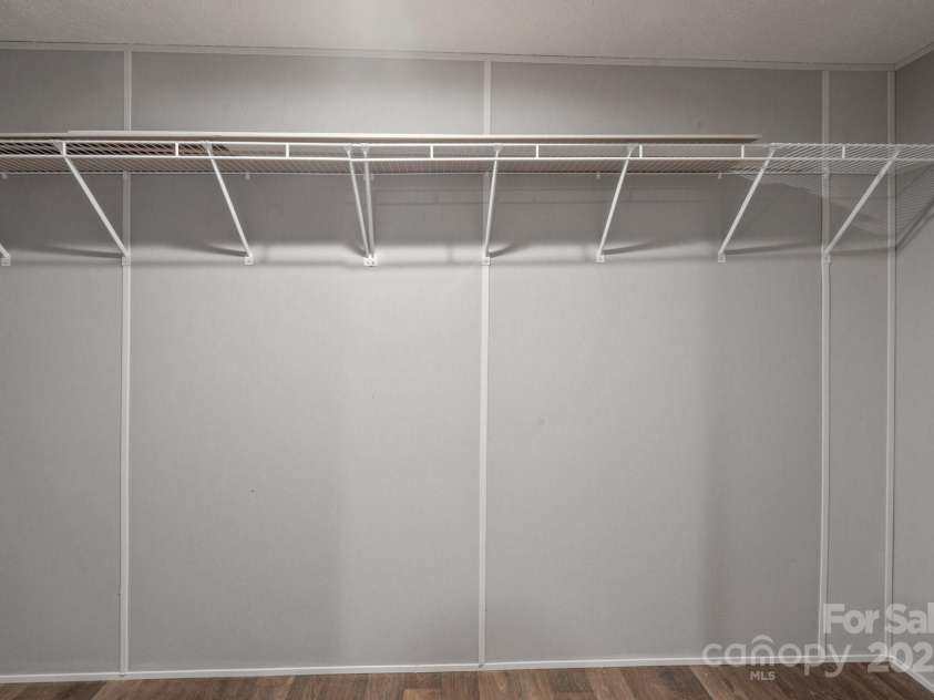 1128 Bethesda Road, Statesville, NC 28677.  MLS# CAR4185804, YatesRealty ID 11420. Large Closet in Primary Bathroom