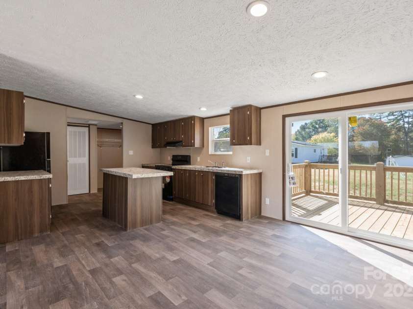 1128 Bethesda Road, Statesville, NC 28677.  MLS# CAR4185804, YatesRealty ID 11420. Tons of Natural Light from the Sliding Glass Door