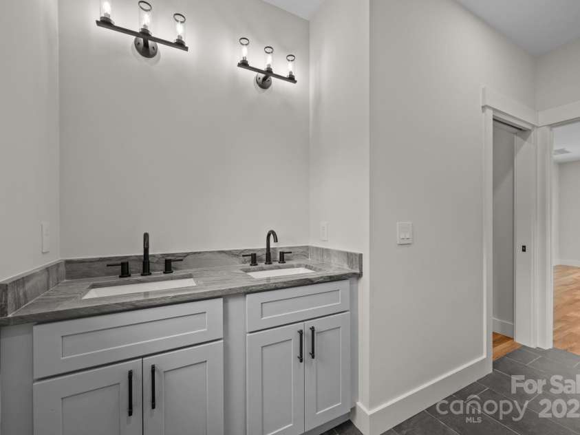 117 Third Street, Asheville, NC 28803.  MLS# CAR4293672, YatesRealty ID 11422. Double vanities