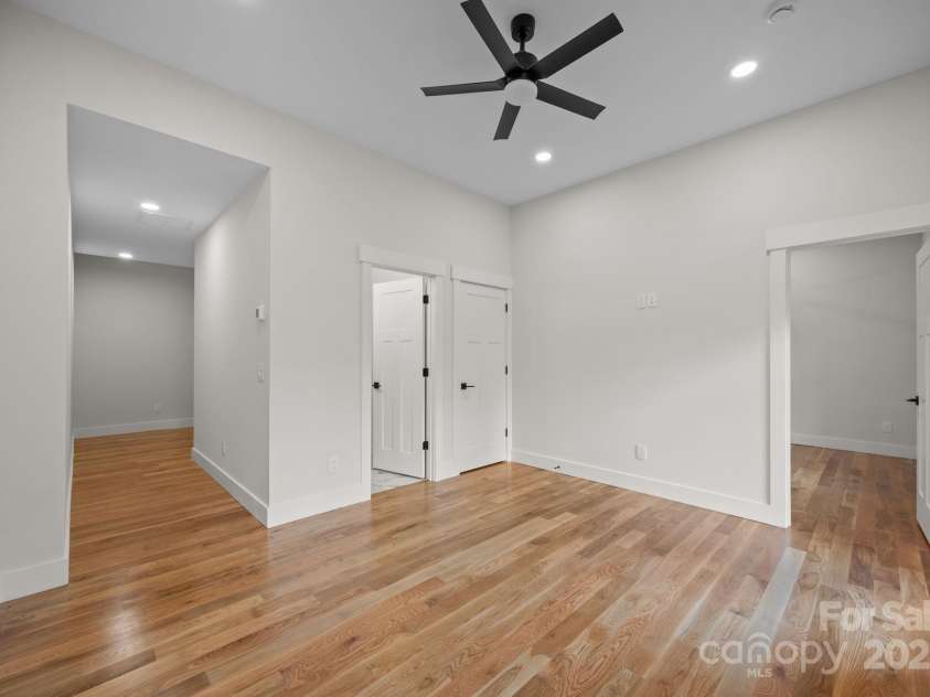 117 Third Street, Asheville, NC 28803.  MLS# CAR4293672, YatesRealty ID 11422. Lower level living area