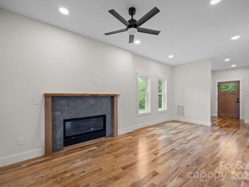117 Third Street, Asheville, NC 28803.  MLS# CAR4293672, YatesRealty ID 11422. Modern gas fireplace