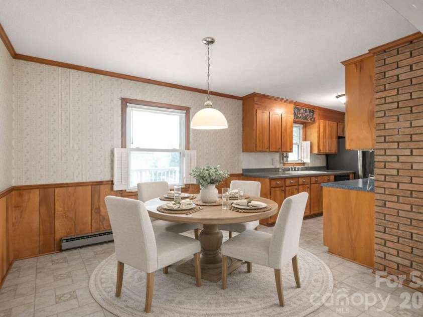 105 Sunset Drive, Locust, NC 28097.  MLS# CAR4368490, YatesRealty ID 11423. Eat-in Kitchen - Virtually Staged