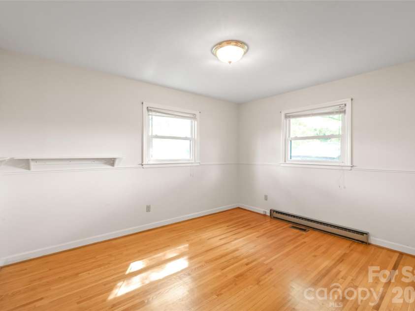 105 Sunset Drive, Locust, NC 28097.  MLS# CAR4368490, YatesRealty ID 11423. First Secondary Bedroom