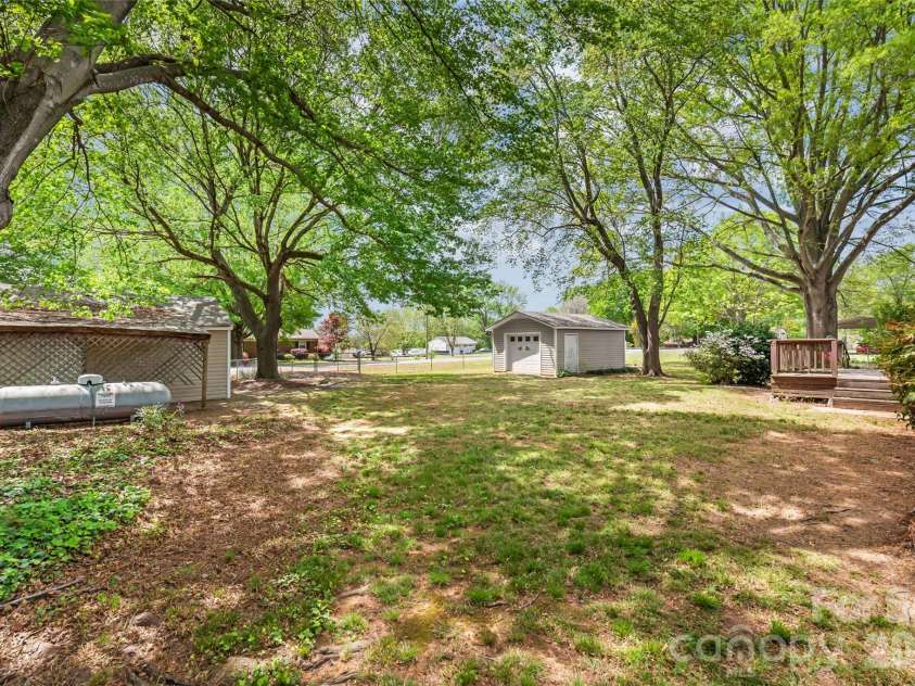 105 Sunset Drive, Locust, NC 28097.  MLS# CAR4368490, YatesRealty ID 11423. Gorgeous Backyard
