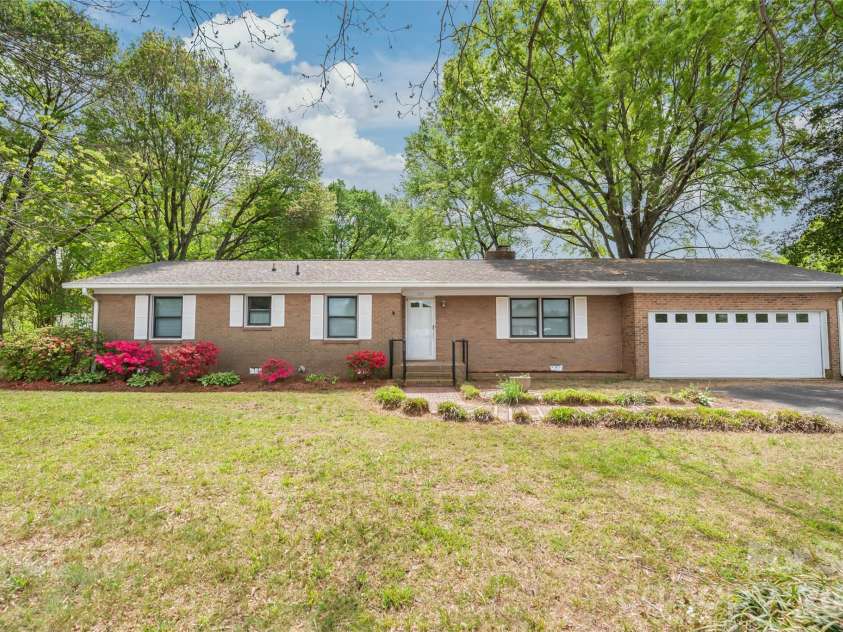 105 Sunset Drive, Locust, NC 28097.  MLS# CAR4368490, YatesRealty ID 11423. Gorgeous Curb Appeal