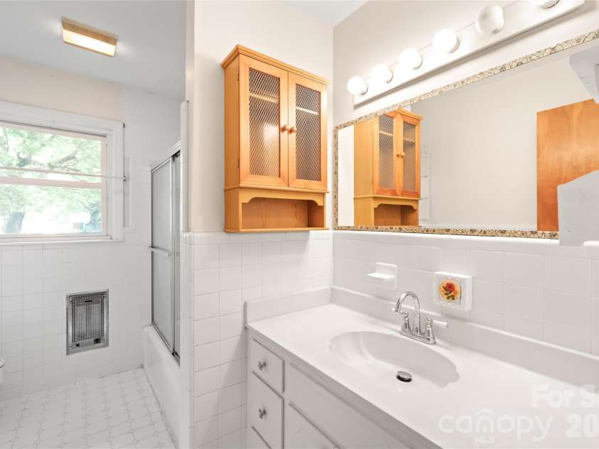 105 Sunset Drive, Locust, NC 28097.  MLS# CAR4368490, YatesRealty ID 11423. Hall Full Bathroom