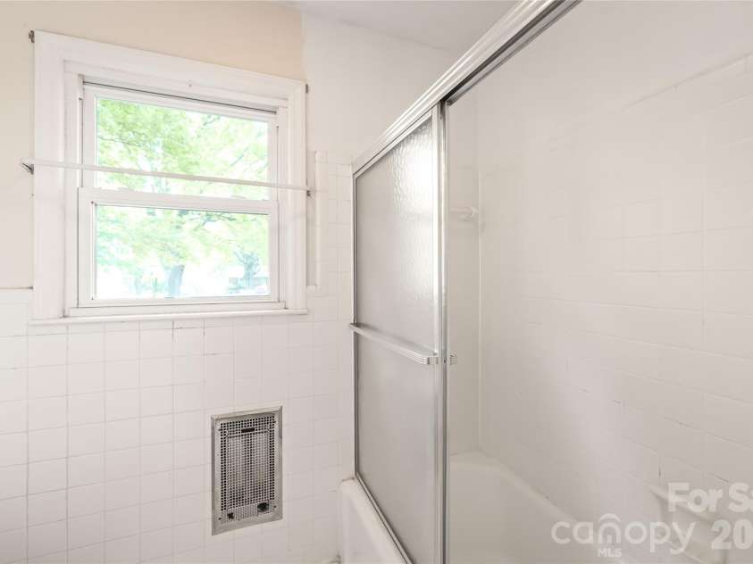 105 Sunset Drive, Locust, NC 28097.  MLS# CAR4368490, YatesRealty ID 11423. Hall Full Bathroom