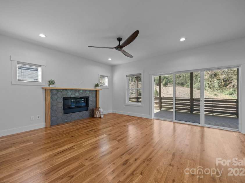 87 Glendale Avenue, Asheville, NC 28803.  MLS# CAR4145550, YatesRealty ID 11424. Custom tile fireplace