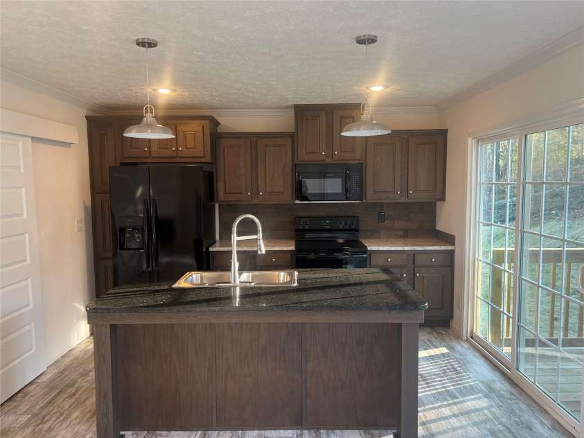 5748 Dalmatian Street, Iron Station, NC 28080.  MLS# CAR3927310, YatesRealty ID 1143. Kitchen